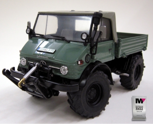 4-1009-1 Mercedes-Benz Unimog 406 (U84) in schaal 1:32 van het merk weise toys
